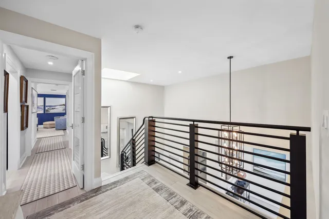 a view of a patio with table and chairs and potted plants