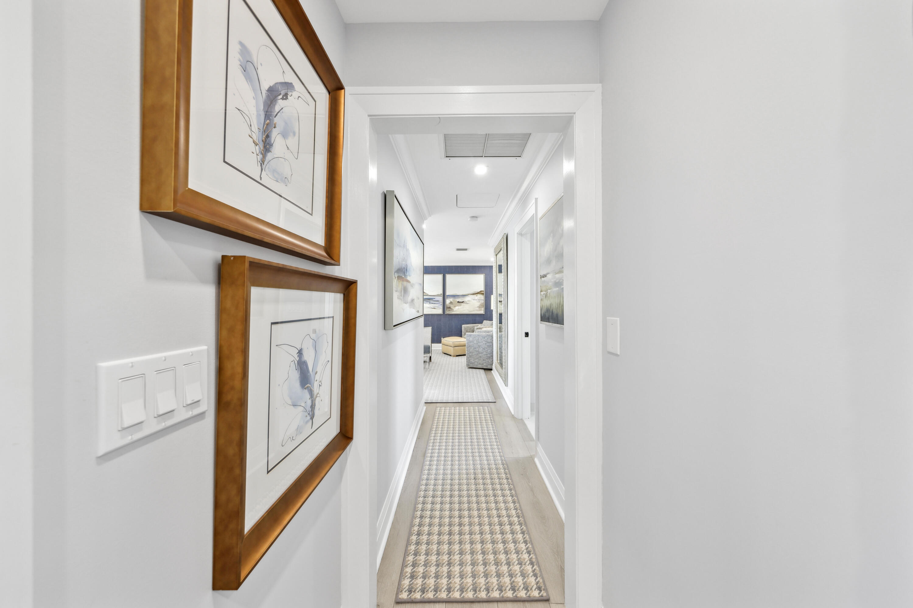 125 Marlin Drive Ocean Ridge, FL 33435 - Photo 30 of 122 a view of a hallway with wooden floor and staircase