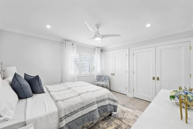 a view of a chair and table in the garden