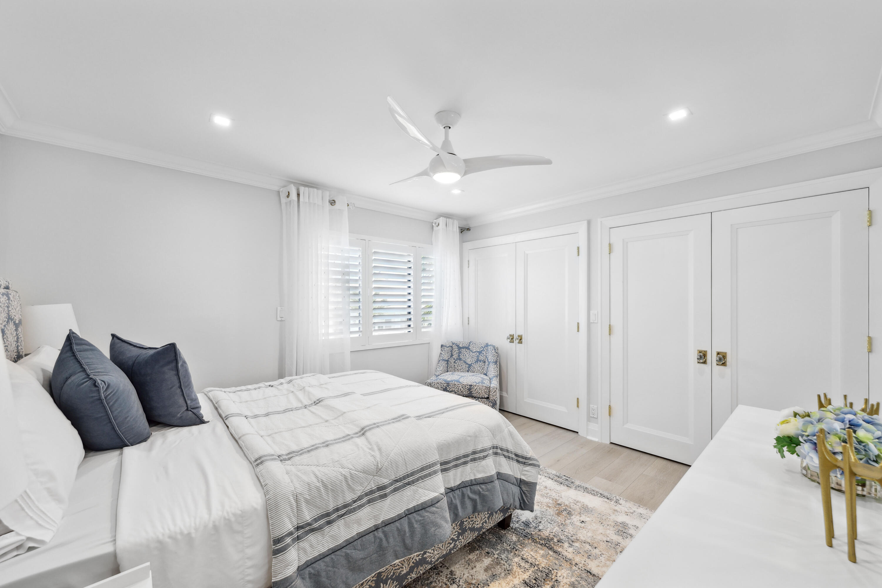 125 Marlin Drive Ocean Ridge, FL 33435 - Photo 46 of 122 a bedroom with a bed and a window