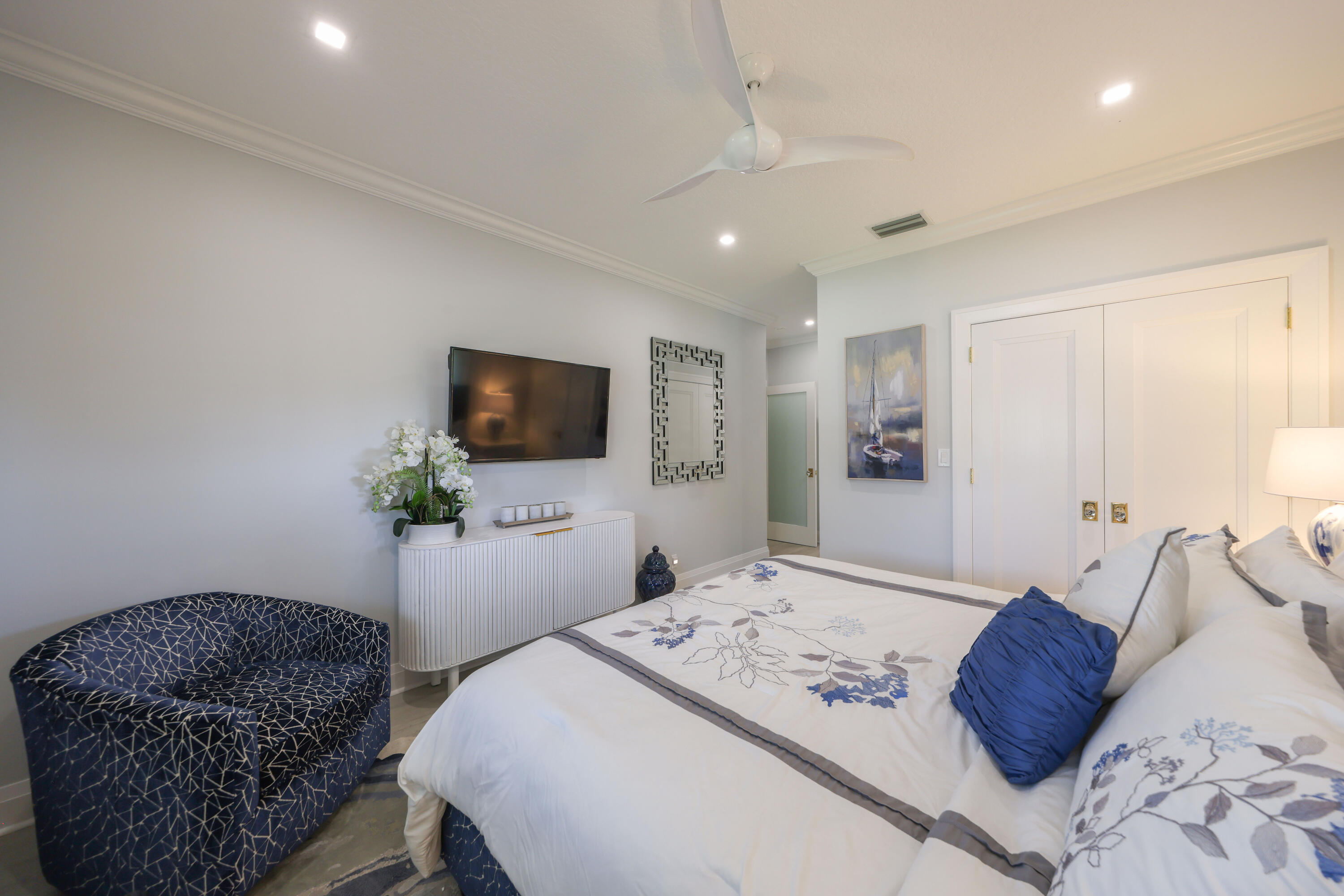 125 Marlin Drive Ocean Ridge, FL 33435 - Photo 56 of 122 a living room with furniture and a flat screen tv