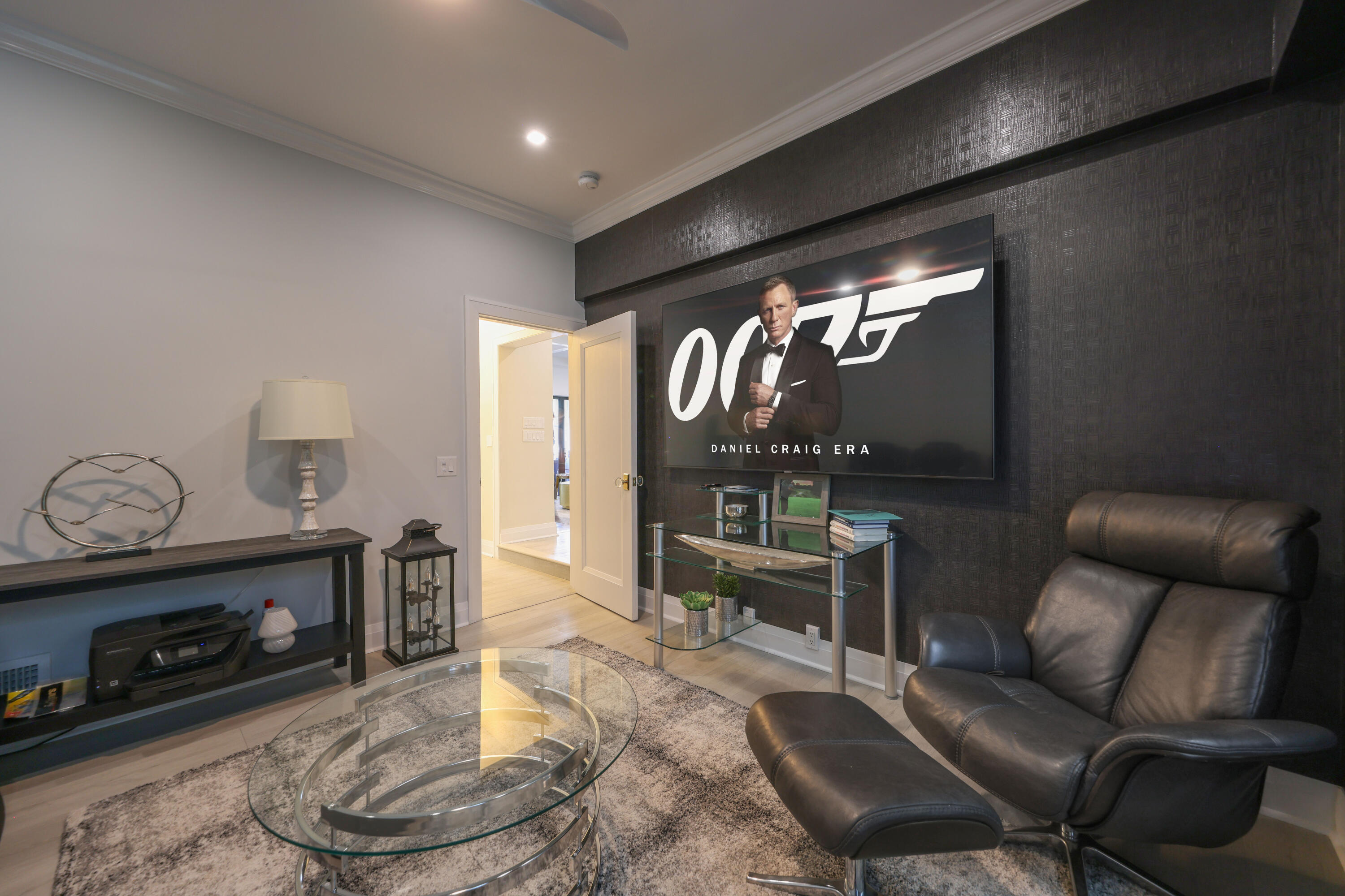 125 Marlin Drive Ocean Ridge, FL 33435 - Photo 59 of 122 a living room with furniture a fireplace and a flat screen tv