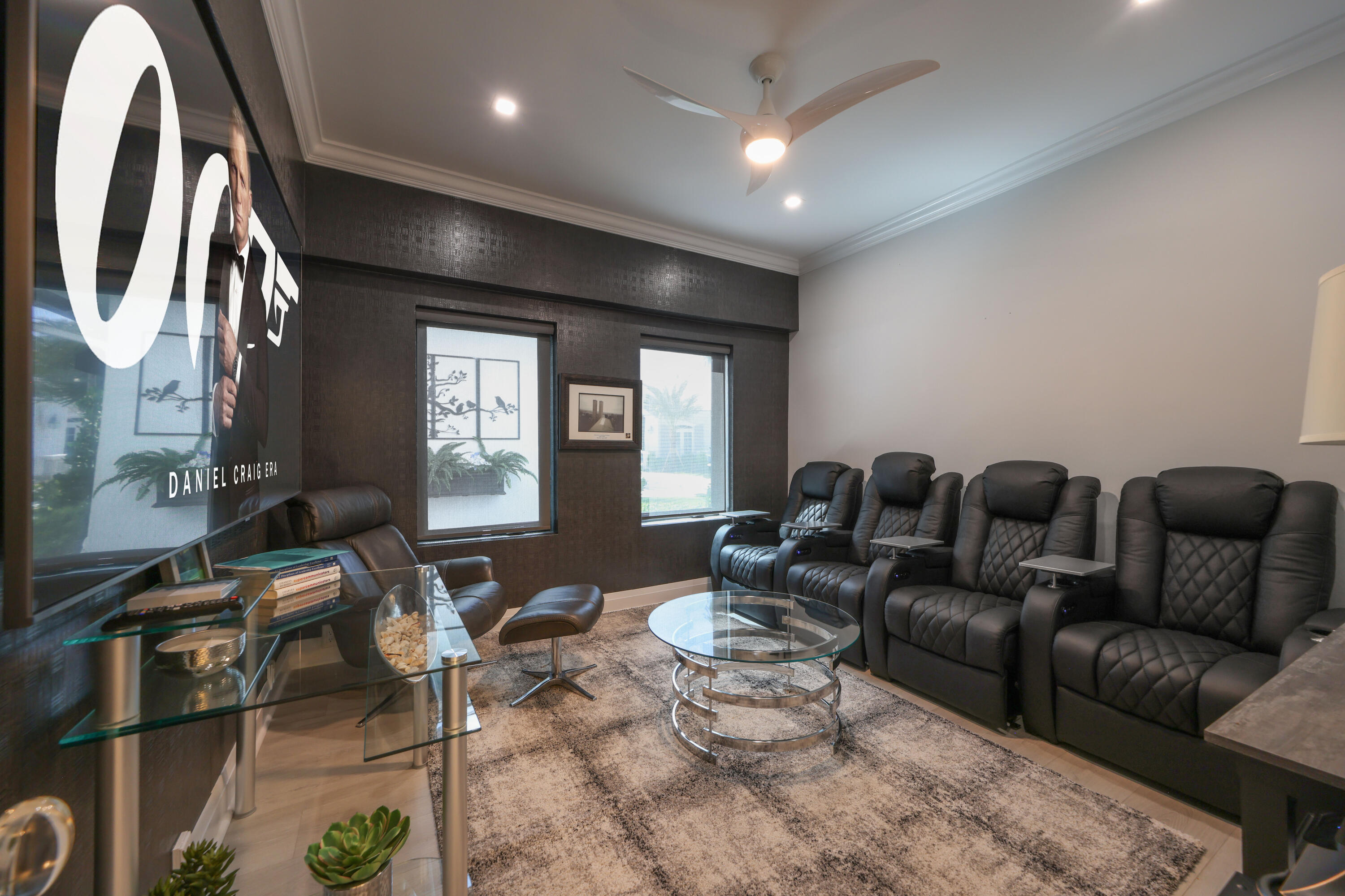 125 Marlin Drive Ocean Ridge, FL 33435 - Photo 60 of 122 a media room with lots of chairs and a projector screen