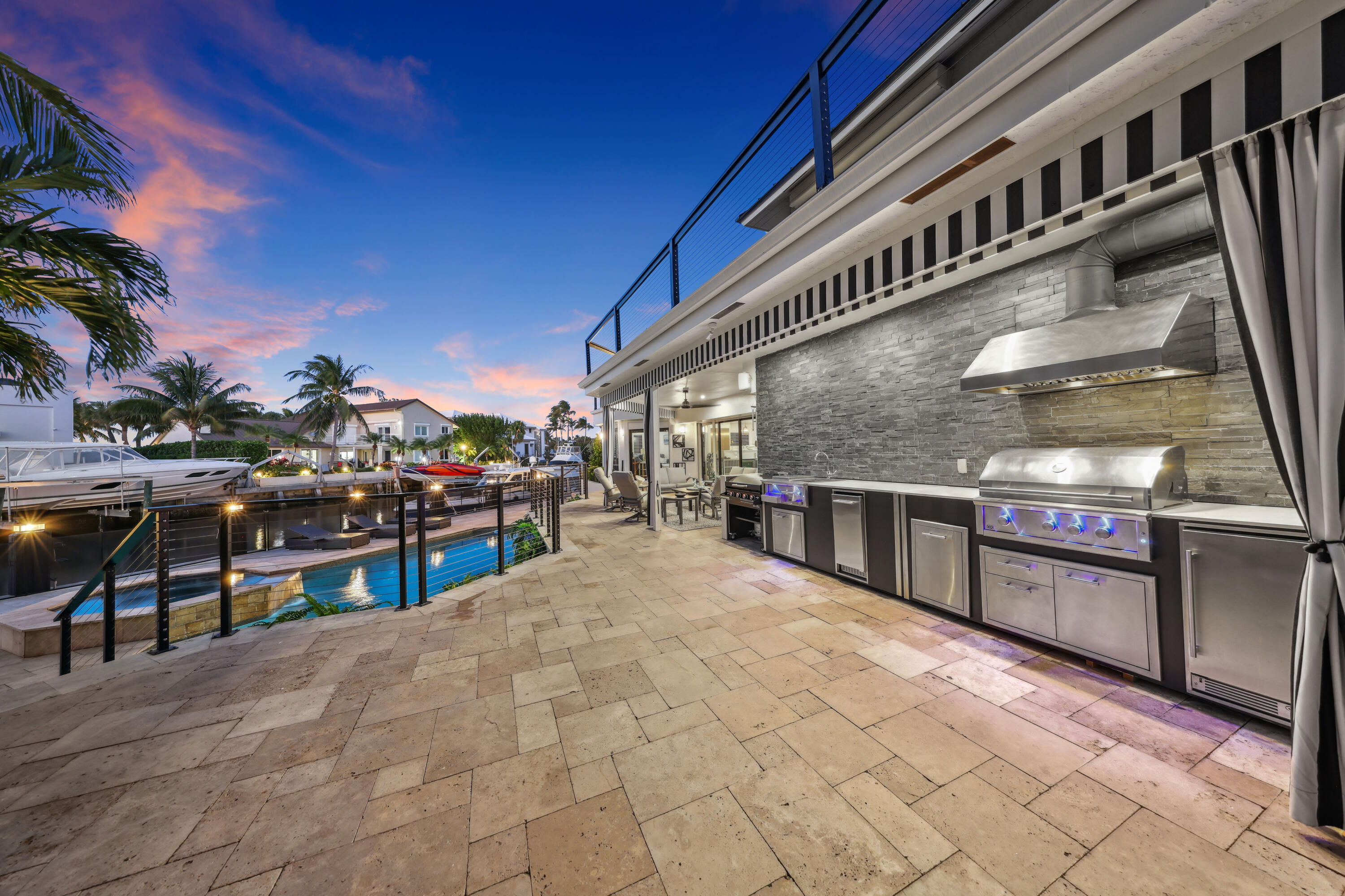 125 Marlin Drive Ocean Ridge, FL 33435 - Photo 72 of 122 a view of a swimming pool with seating area