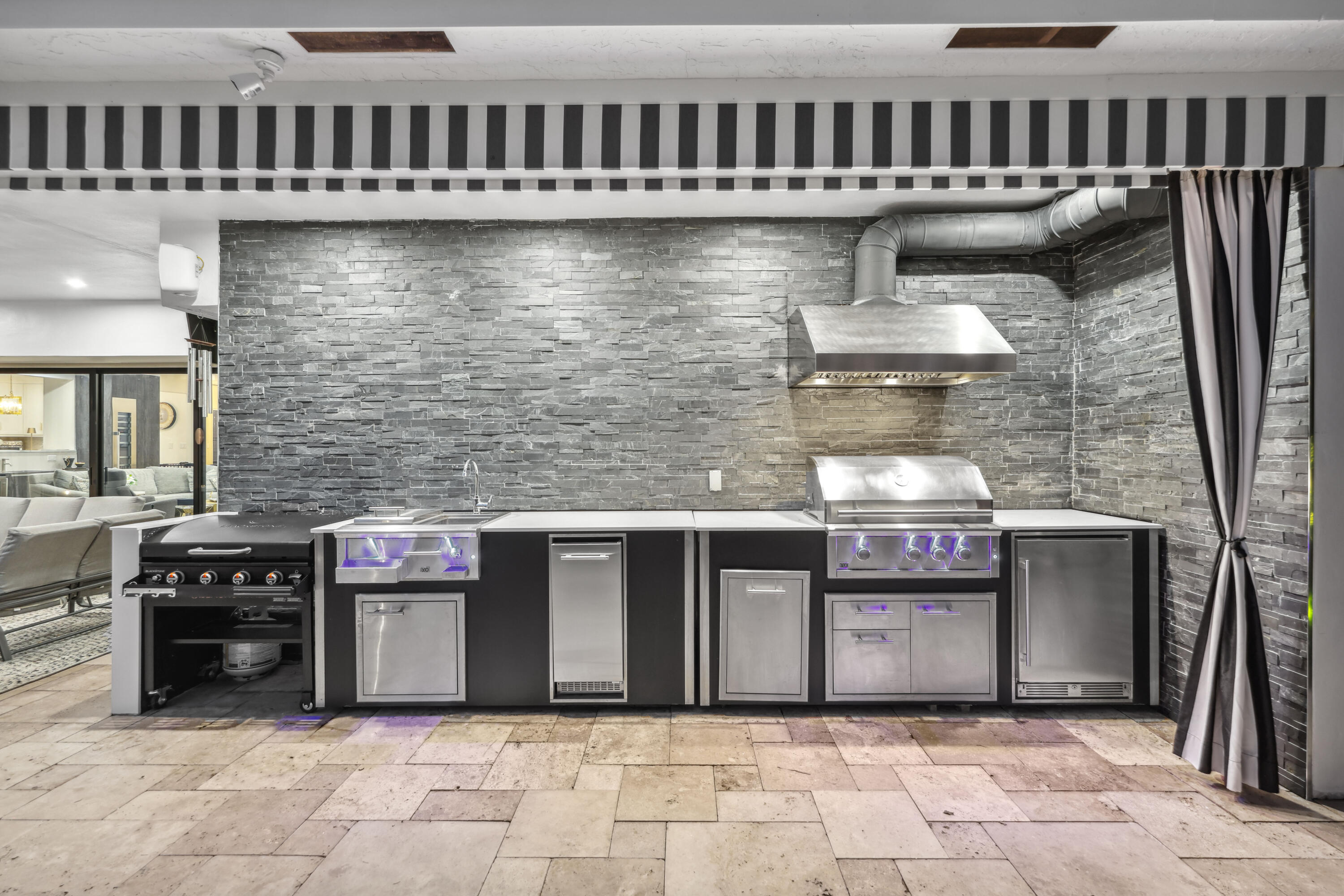 125 Marlin Drive Ocean Ridge, FL 33435 - Photo 73 of 122 a kitchen with stainless steel appliances granite countertop a stove and a sink