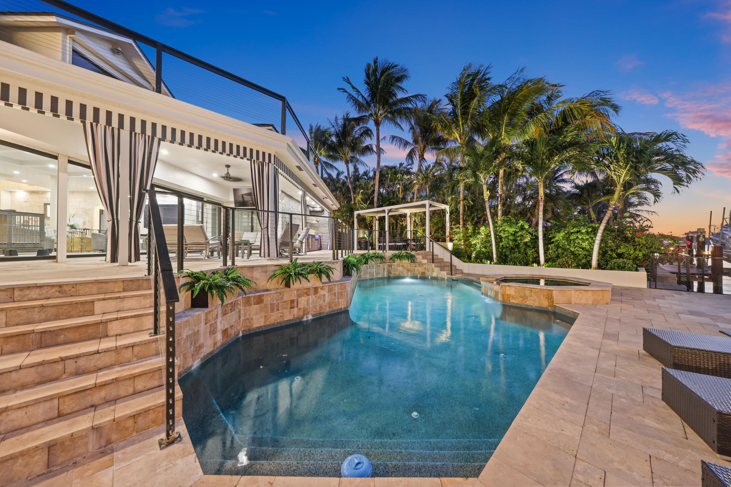 125 Marlin Drive Ocean Ridge, FL 33435 - Photo 77 of 122 a view of a swimming pool with a patio