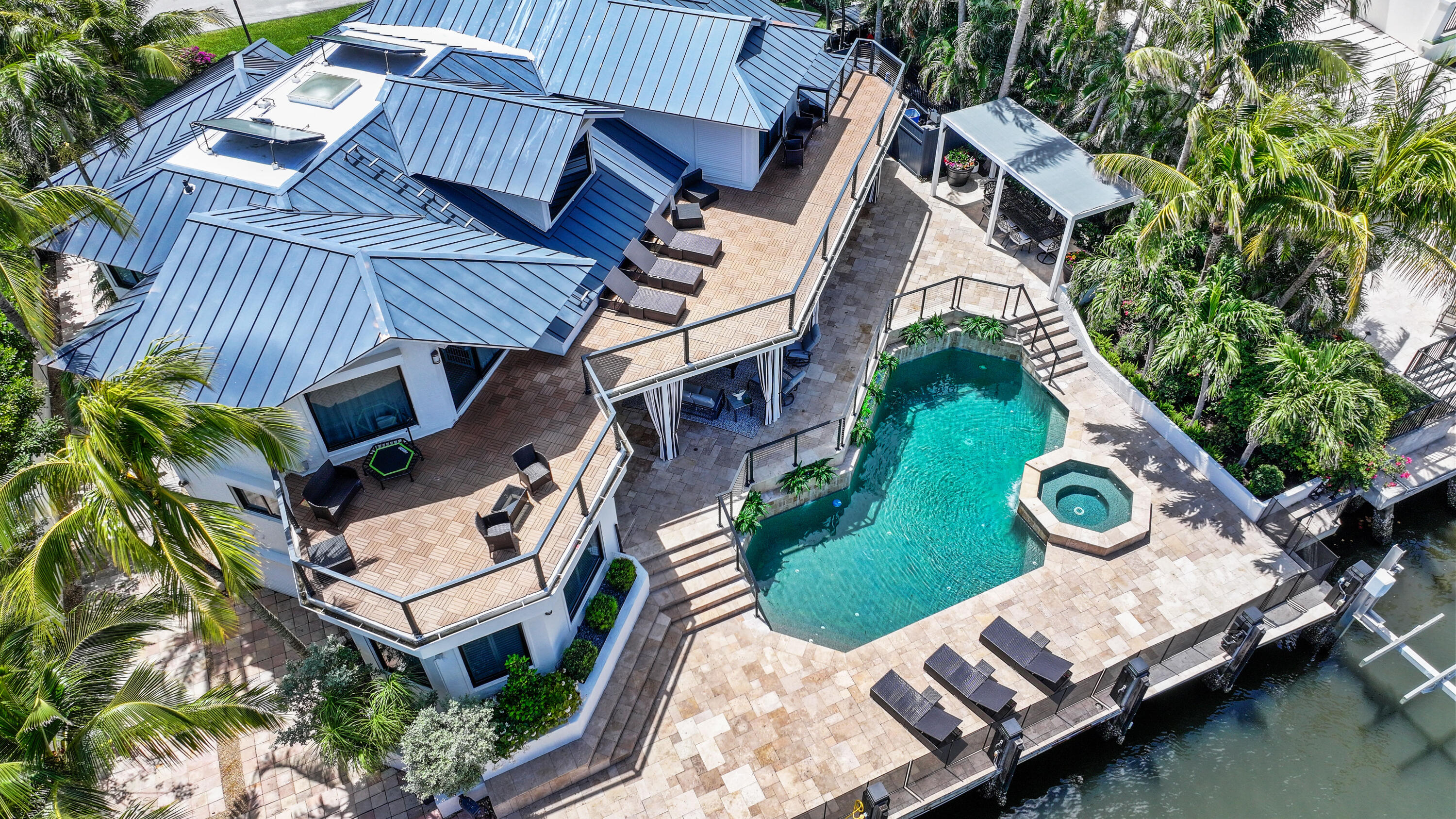 125 Marlin Drive Ocean Ridge, FL 33435 - Photo 97 of 122 an aerial view of a house with a garden and swimming pool