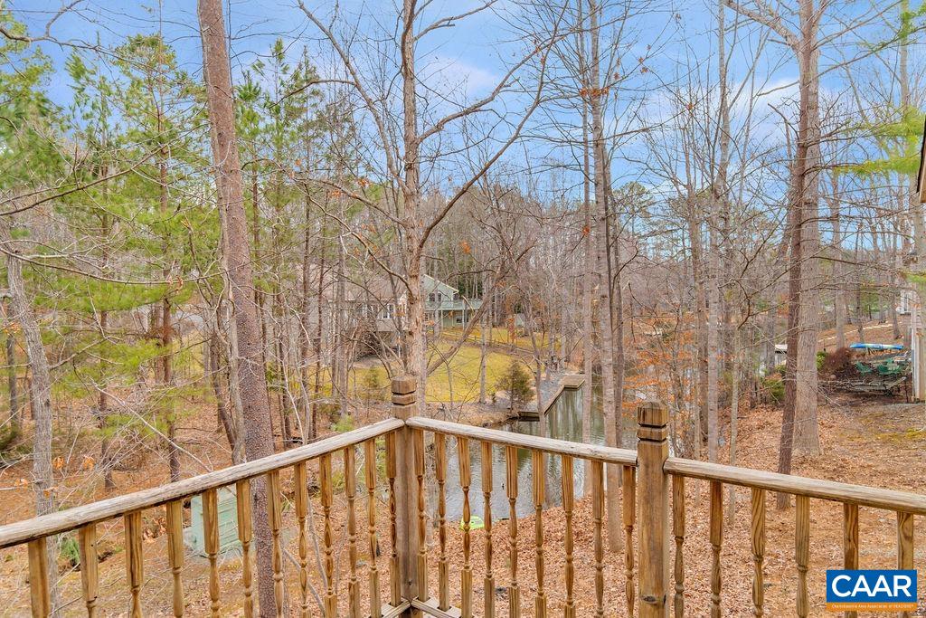 33 Amethyst Road Palmyra, VA 22963 - Photo 20 of 62 a view of a balcony with a yard