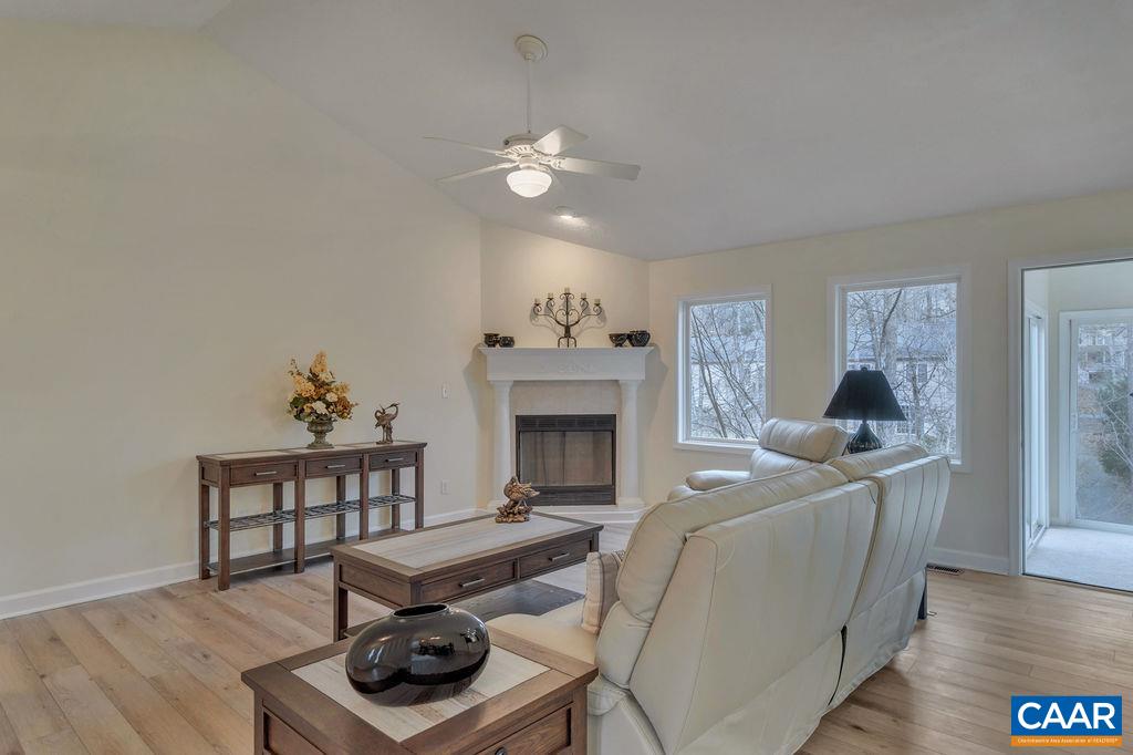 33 Amethyst Road Palmyra, VA 22963 - Photo 8 of 62 a living room with furniture and a fireplace