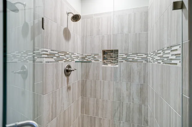 a bathroom with a shower curtain