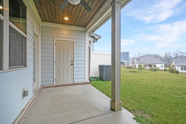 a view of a porch with a backyard