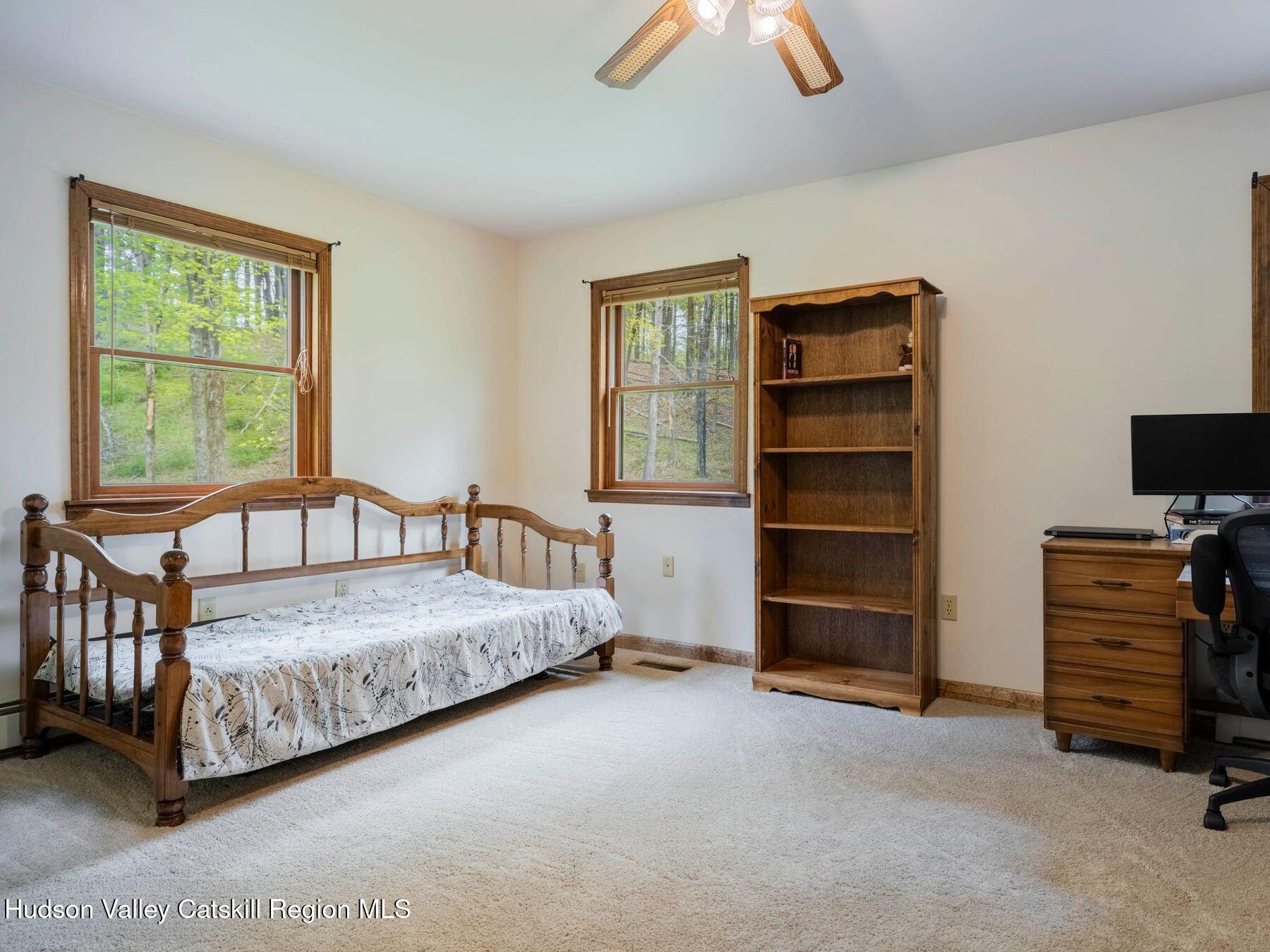 3639 Atwood Road Stone Ridge, NY 12484 - Photo 17 of 31 a bedroom with a bed and a window
