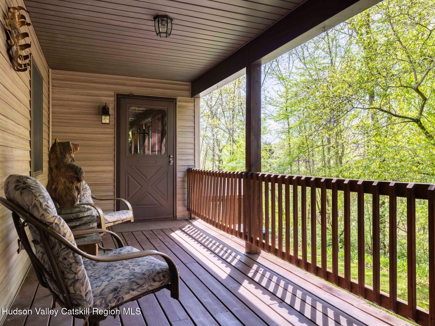 3639 Atwood Road Stone Ridge, NY 12484 - Photo 2 of 31 a balcony with furniture