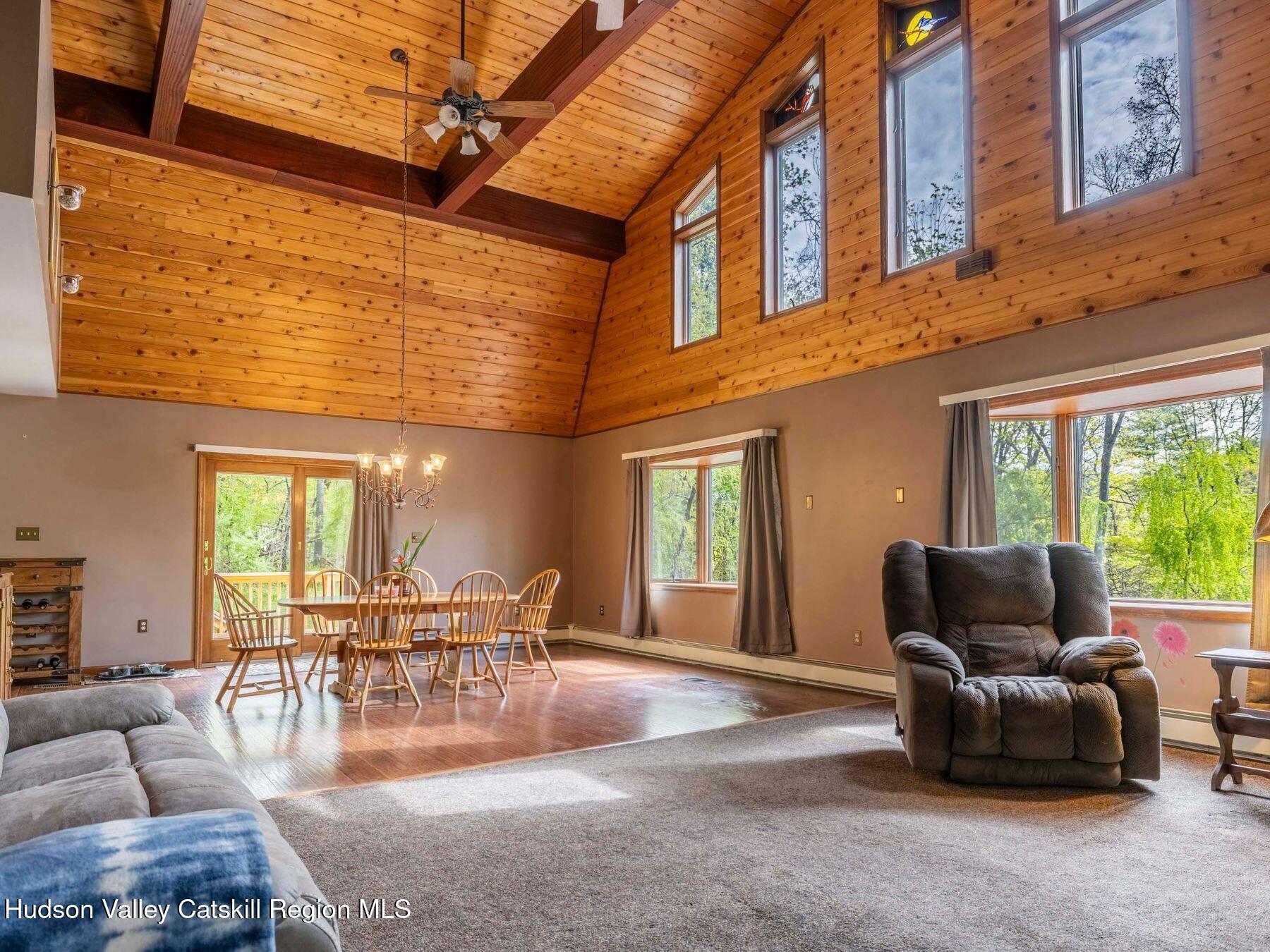3639 Atwood Road Stone Ridge, NY 12484 - Photo 6 of 31 a living room with furniture and a large window