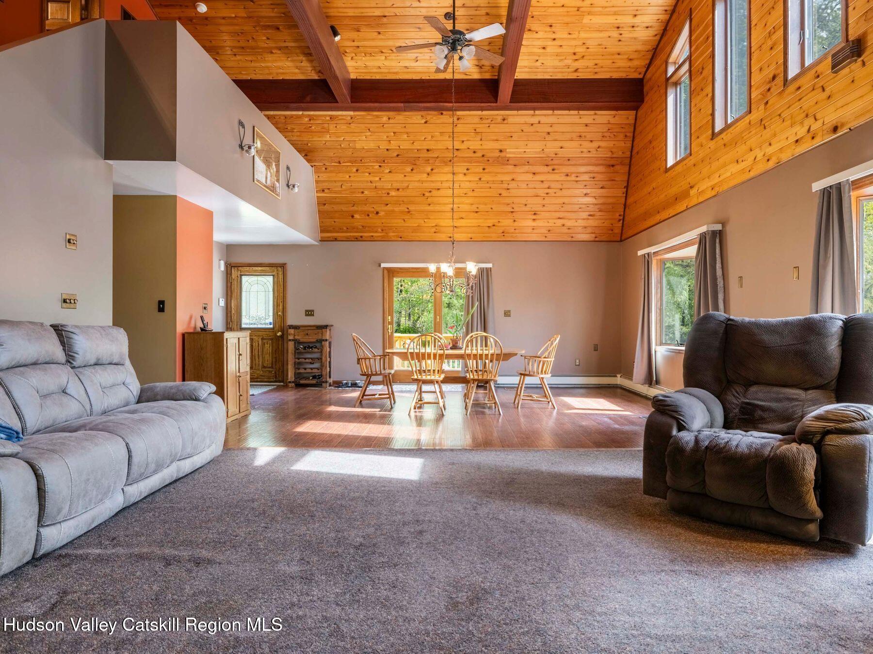 3639 Atwood Road Stone Ridge, NY 12484 - Photo 8 of 31 a living room with furniture and wooden floor
