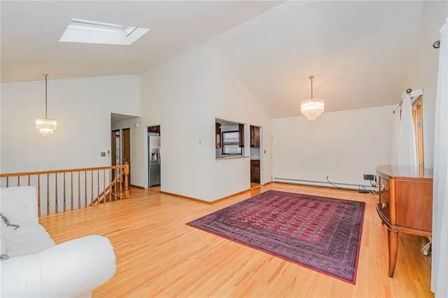 a bedroom with a bed and dresser