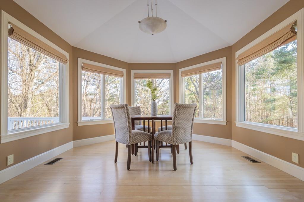 6 Johnson Farm Road Lexington, MA 02420 - Photo 16 of 42 a view of a dining room with furniture and windows