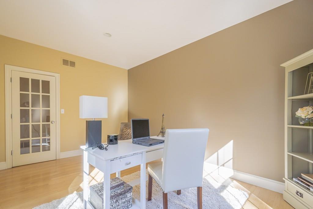 6 Johnson Farm Road Lexington, MA 02420 - Photo 23 of 42 a view of a dining room with furniture and a window