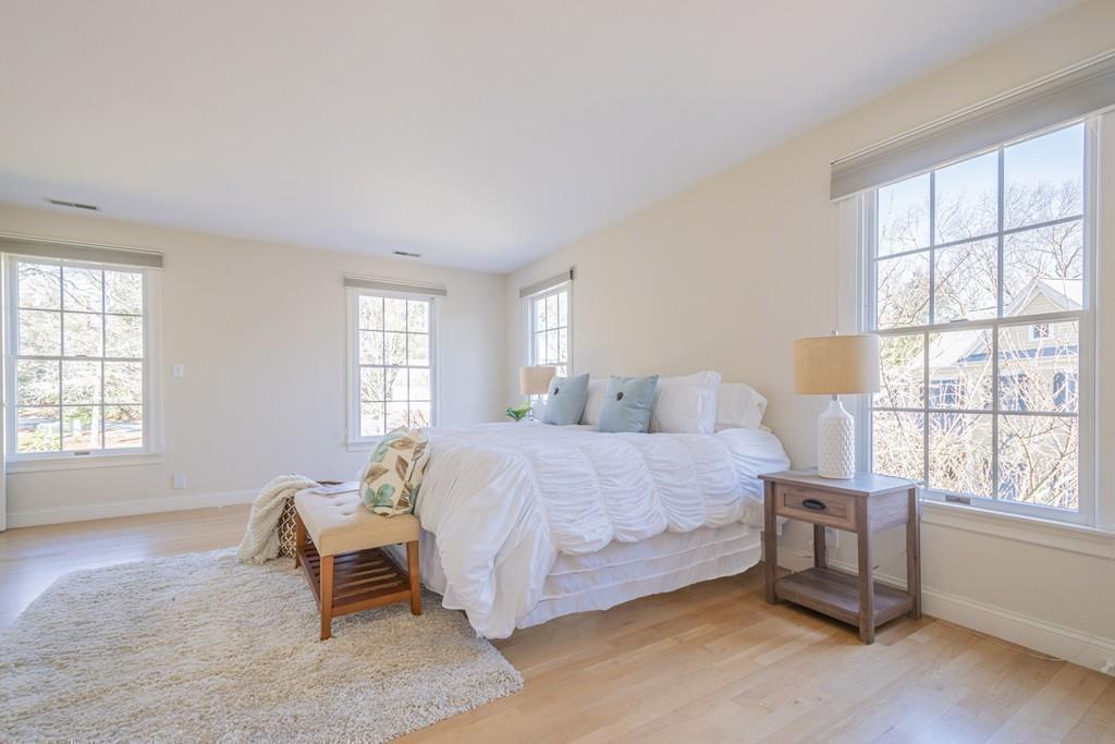 6 Johnson Farm Road Lexington, MA 02420 - Photo 25 of 42 a spacious bedroom with a bed and a window