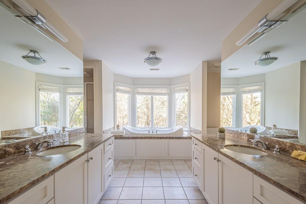 6 Johnson Farm Road Lexington, MA 02420 - Photo 27 of 42 a large white kitchen with a sink and large window