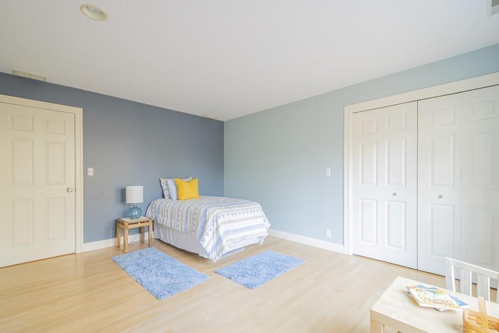 6 Johnson Farm Road Lexington, MA 02420 - Photo 32 of 42 a spacious bedroom with a bed and a window