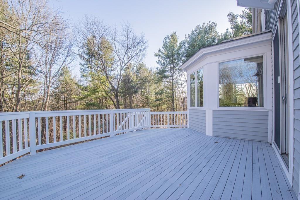 6 Johnson Farm Road Lexington, MA 02420 - Photo 41 of 42 a view of backyard with a deck and wooden floor