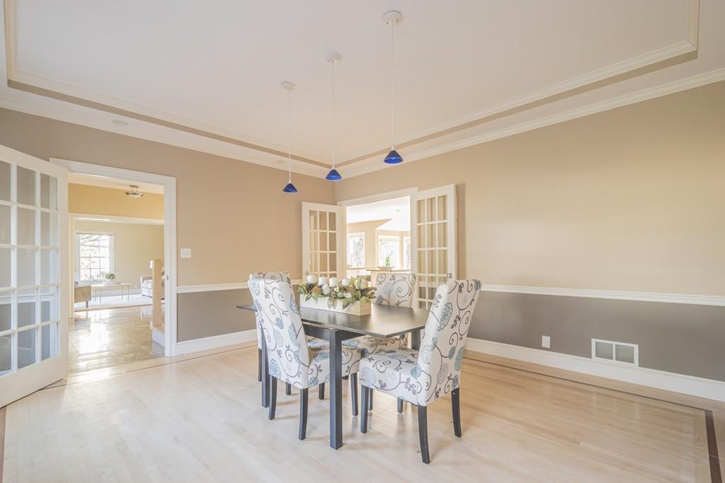 6 Johnson Farm Road Lexington, MA 02420 - Photo 7 of 42 a view of a dining room with furniture and wooden floor