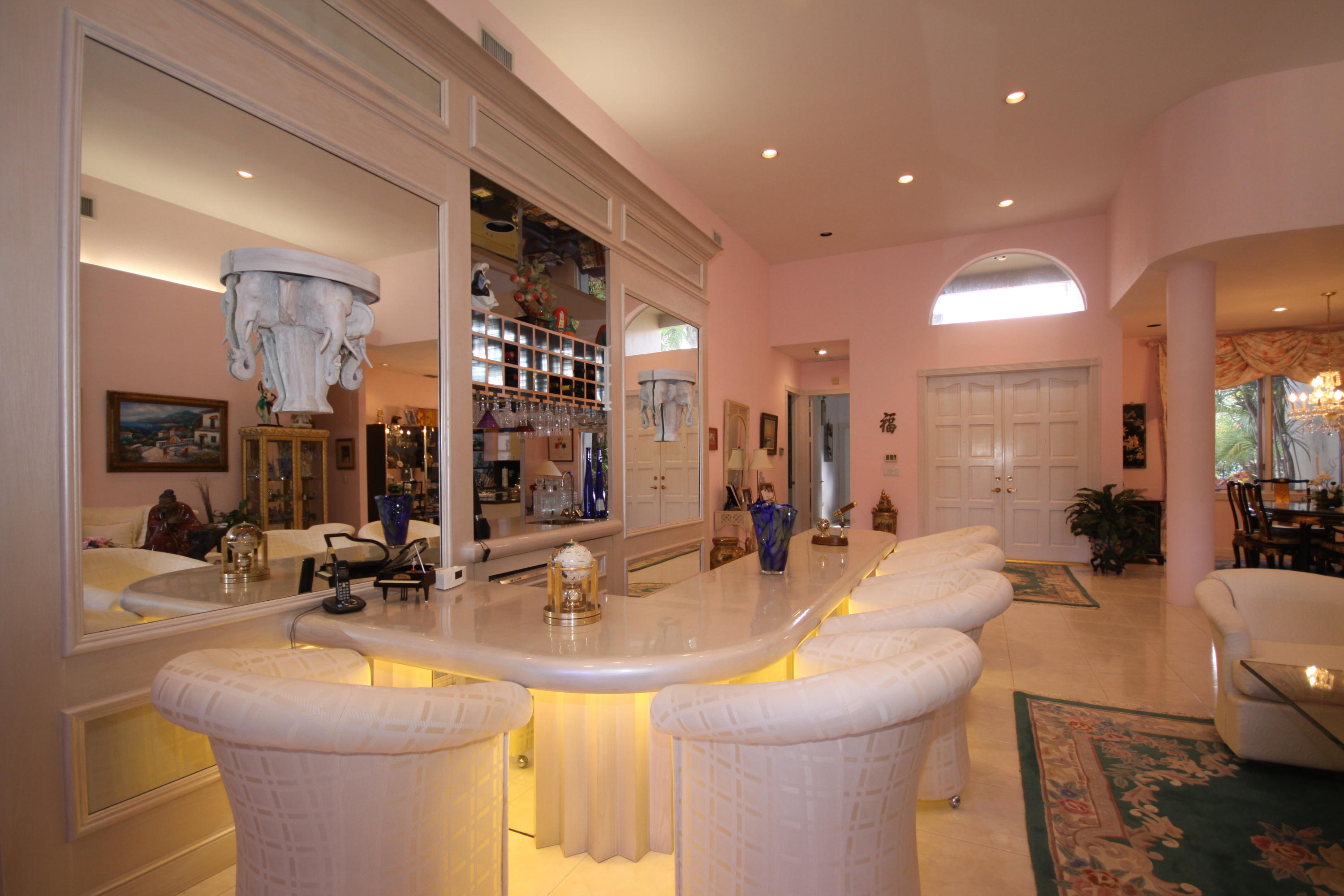 2264 Northwest 60th Street Boca Raton, FL 33496 - Photo 9 of 19 a lobby with a couch and a sink