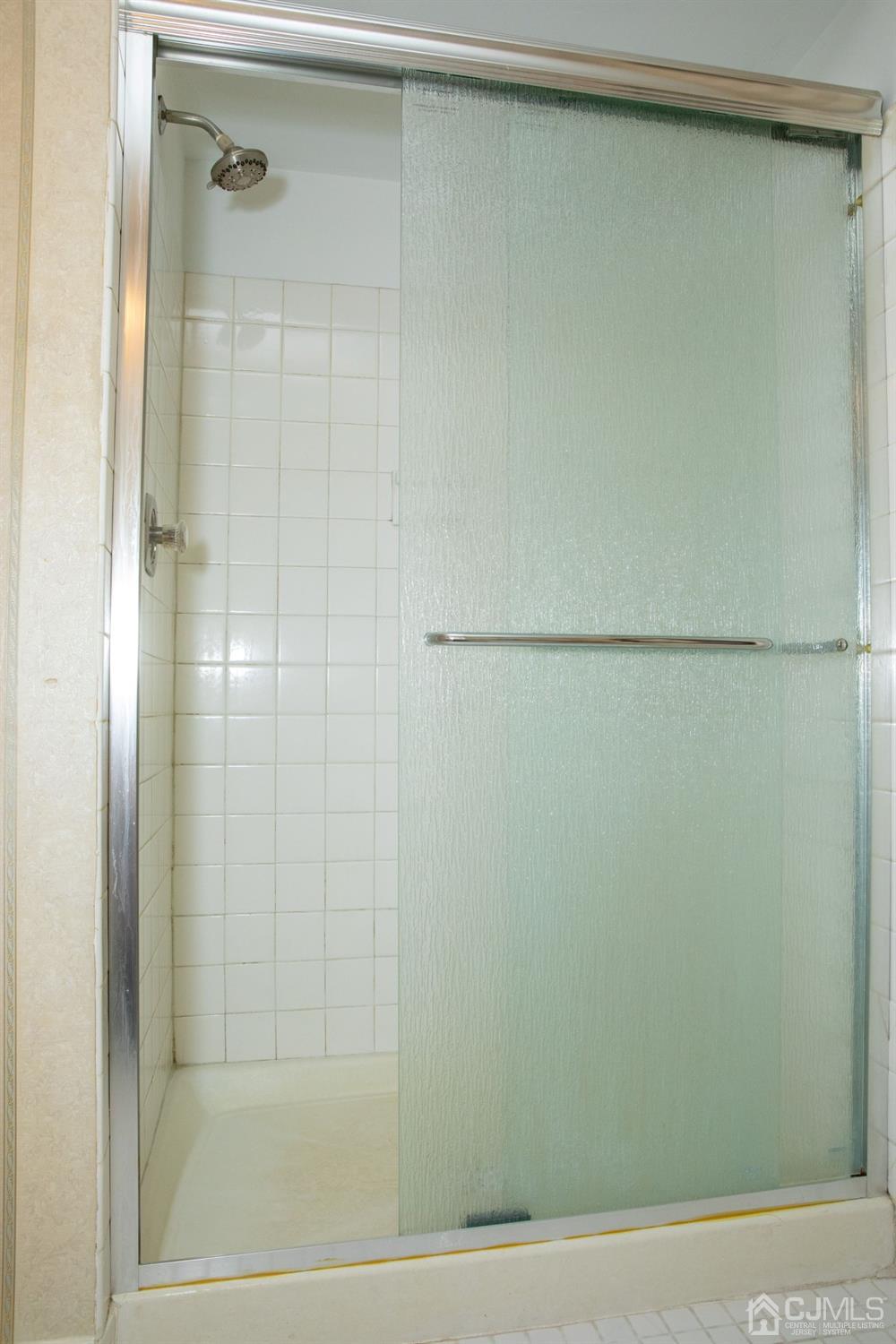 111 Keystone Court, Unit A Woodbridge, NJ 07095 - Photo 25 of 33 a bathroom with a shower
