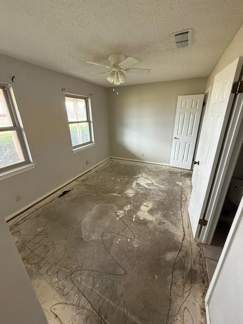 303 New Highland Road Springtown, TX 76082 - Photo 7 of 19 a view of an empty room with a window