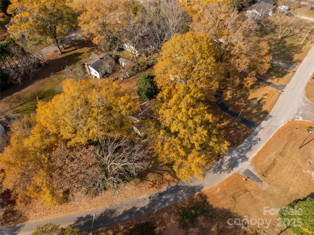 a view of outdoor space with wooden fence
