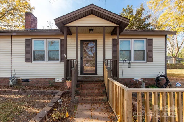a front view of a house with a porch