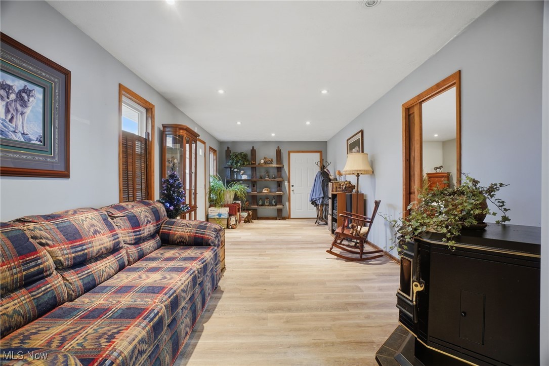 2146 Clay Road Dorset, OH 44032 - Photo 24 of 40 Living area featuring light LTV floors and recessed lighting