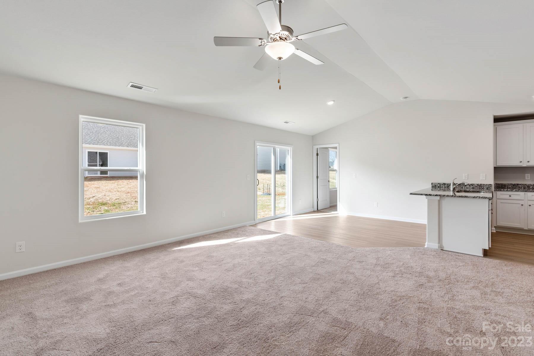 1612 Nia Road Charlotte, NC 28215 - Photo 3 of 15 a view of an empty room with a window