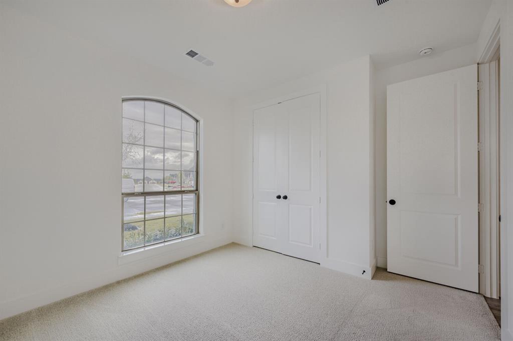 242 Buffalo Boulevard Rhome, TX 76078 - Photo 16 of 28 a view of an empty room with a window