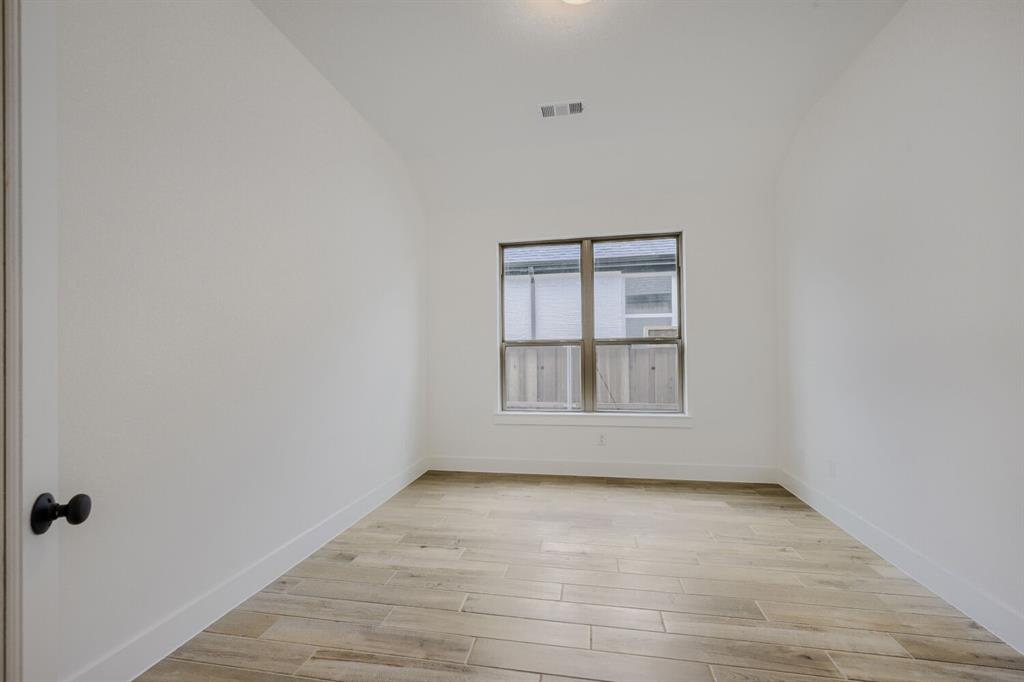 242 Buffalo Boulevard Rhome, TX 76078 - Photo 18 of 28 an empty room with a window