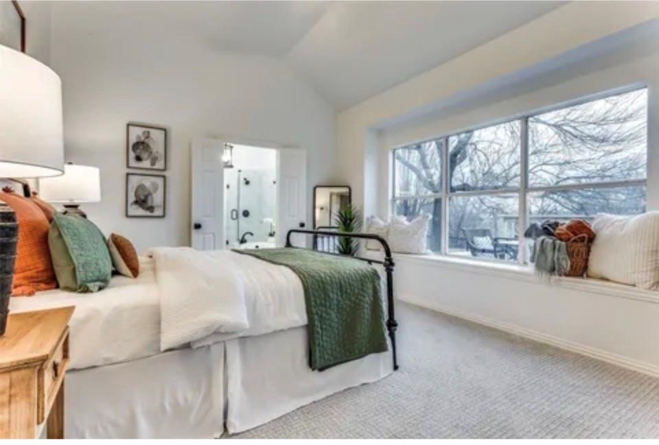 1377 Riley Drive Carrollton, TX 75007 - Photo 18 of 27 a bedroom with a bed and window