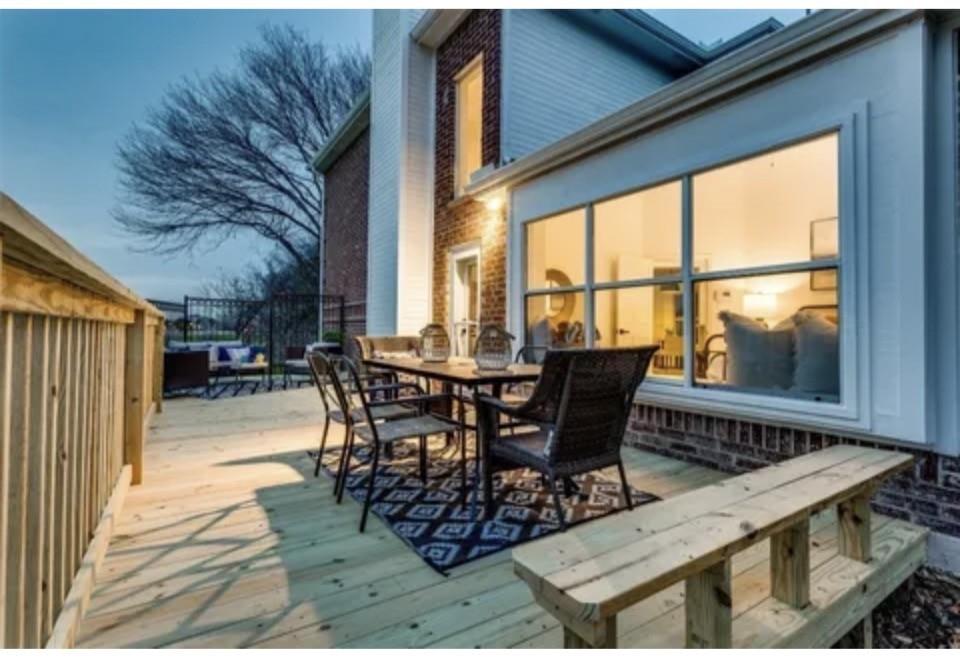 1377 Riley Drive Carrollton, TX 75007 - Photo 26 of 27 a view of a dining table and chairs in the balcony