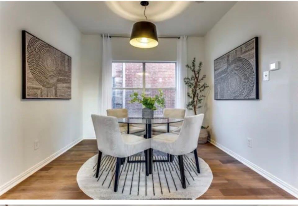1377 Riley Drive Carrollton, TX 75007 - Photo 9 of 27 a dining room with furniture and window
