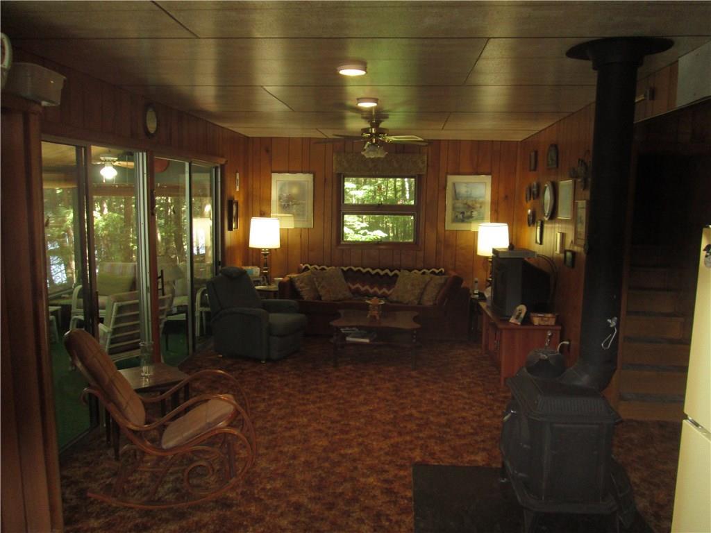 7 Cottage Road Mount Vernon, ME 04352 - Photo 9 of 16 living area with sliders onto...