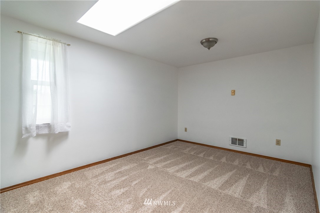101 Rilla Lane Sequim, WA 98382 - Photo 22 of 25 a view of an empty room with a window