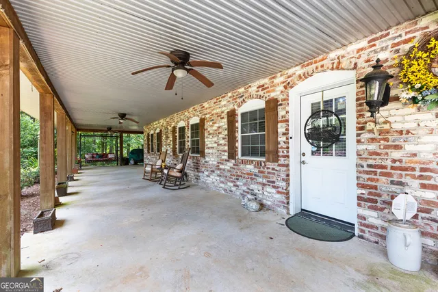 a kitchen with stainless steel appliances granite countertop a stove cabinets and microwave