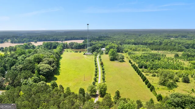 a view of a lake with a yard