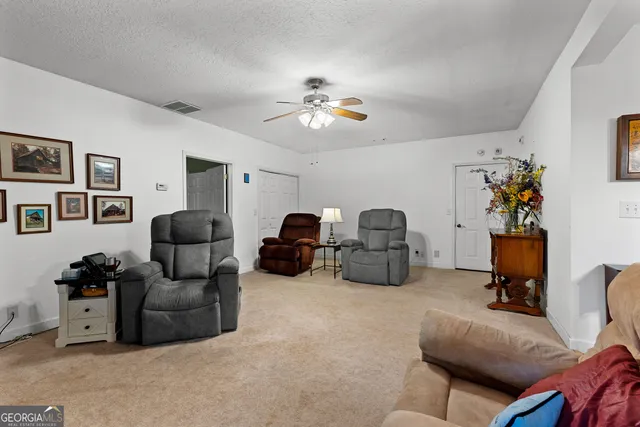 a view of a porch with wooden floor and city view