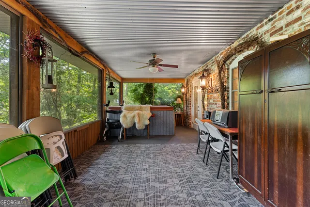 a bedroom with a bed and cabinet