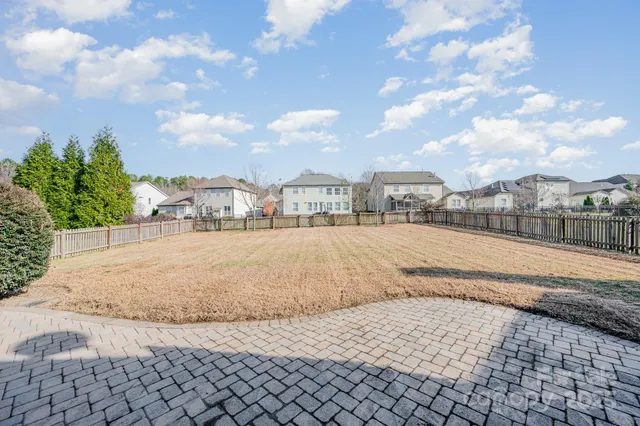 a view of swimming pool with outdoor seating