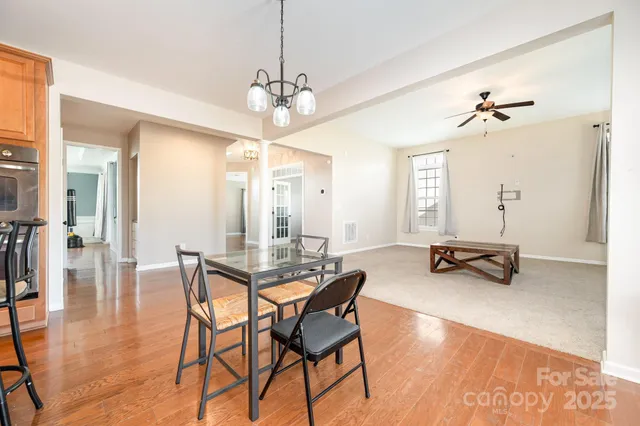a view of a livingroom and dining room
