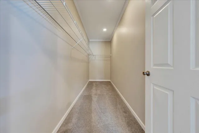 an empty room with fan and a ceiling fan