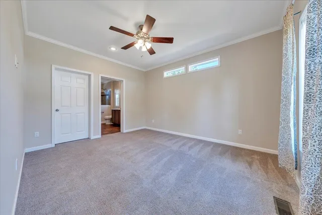 a bathroom with a sink toilet a mirror and shower