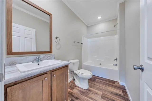 an empty room with fan and entrance